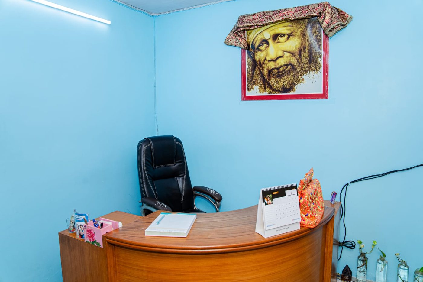 The consulting room where treatment plans are discussed, with a desk and chairs